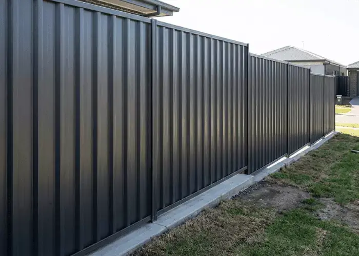 Black Colorbond steel fence in Newcastle backyard